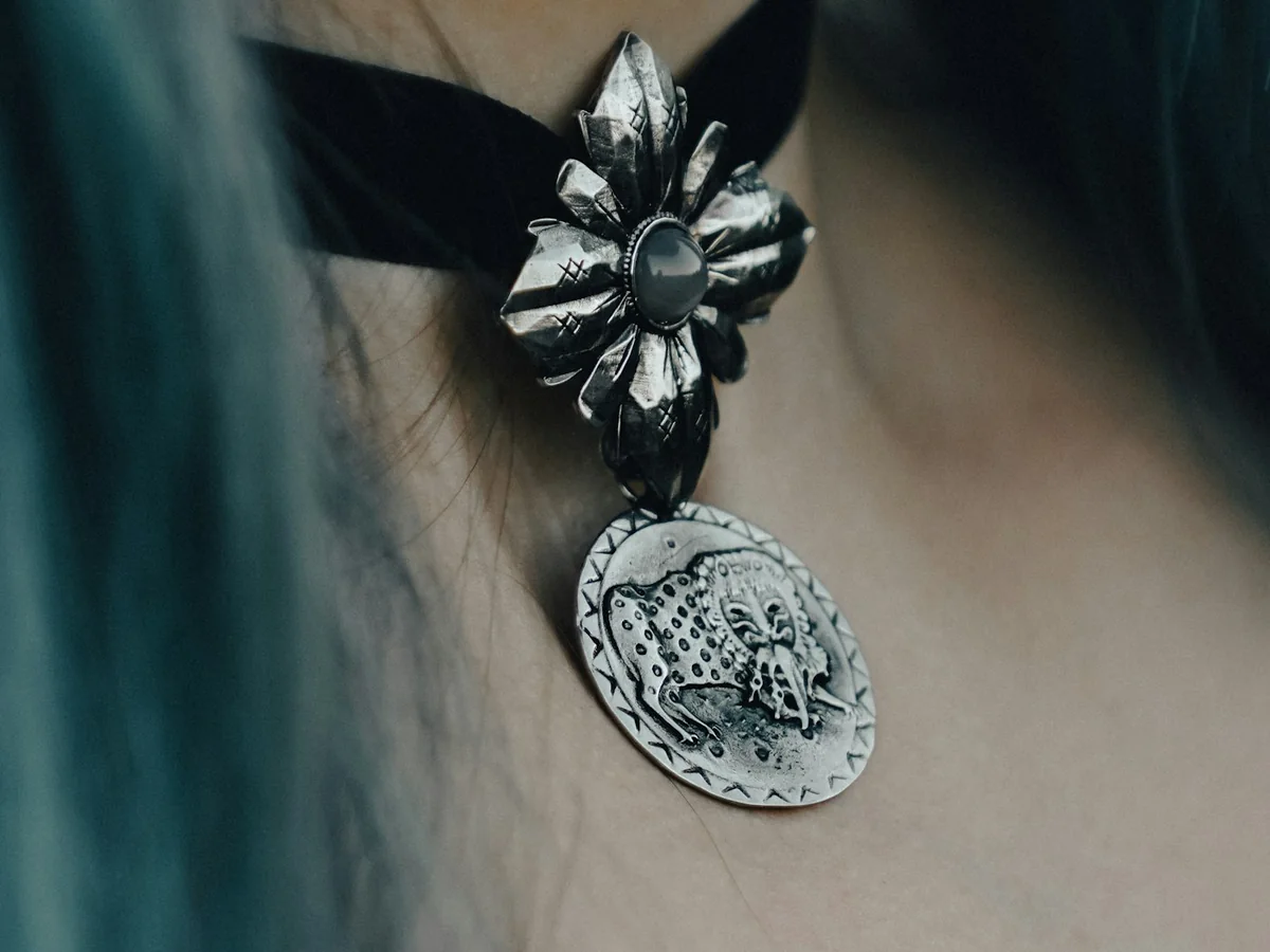 Representative artificial jewellery store photography for the fictional product Oxidised Statement Choker