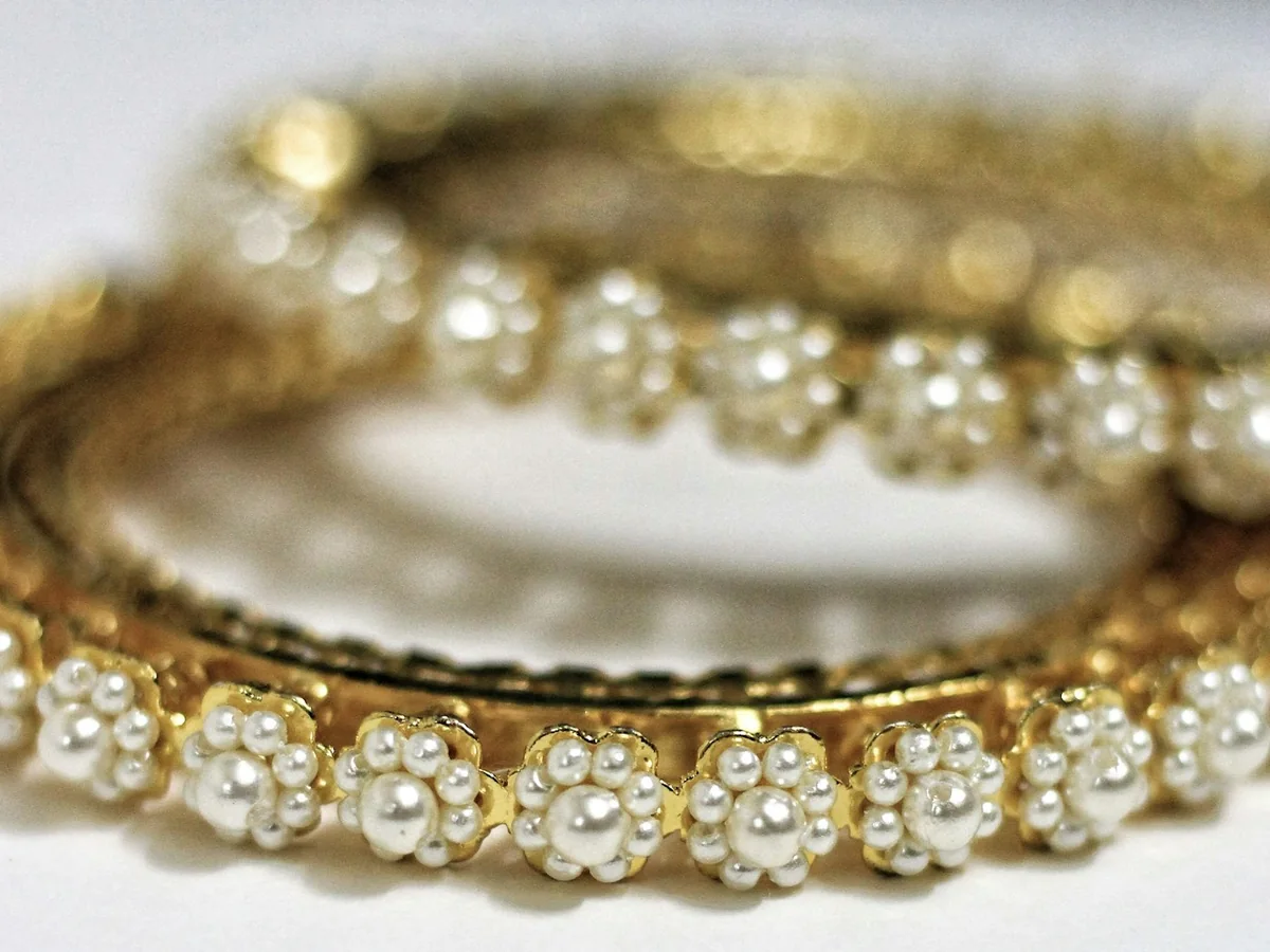 Representative artificial jewellery store photography for the fictional product Everyday Pearl Hoops