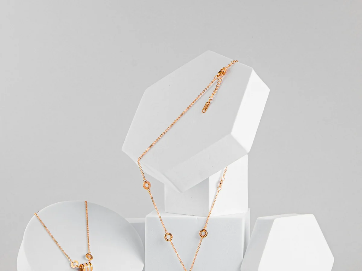 Representative artificial jewellery store photography for the fictional product Contemporary Layered Necklace