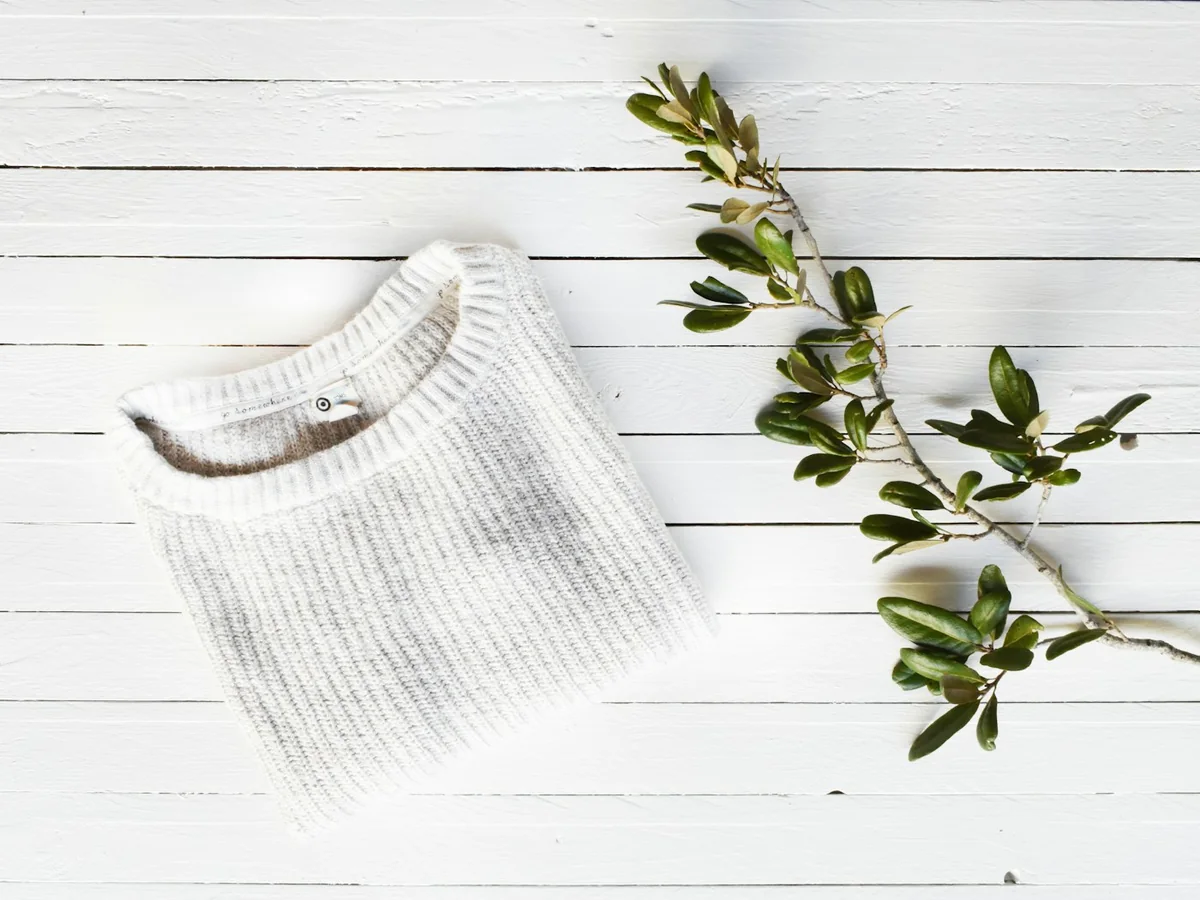 Representative baby clothing photography for the fictional product Cloud Organic Bodysuit