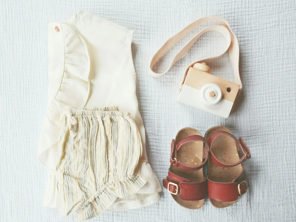 Representative baby clothing photography for the fictional product Little Star Swaddle