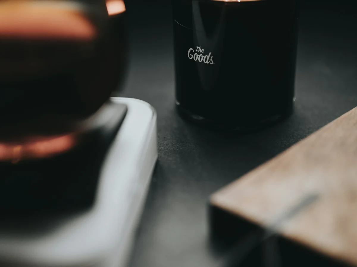 Representative candles and fragrance store photography for the fictional product Quiet Cedar Candle