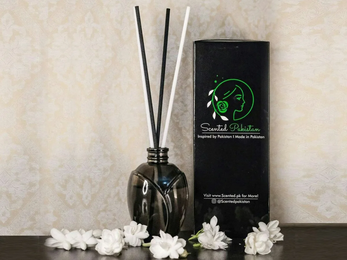 Representative candles and fragrance store photography for the fictional product Jasmine Incense Set