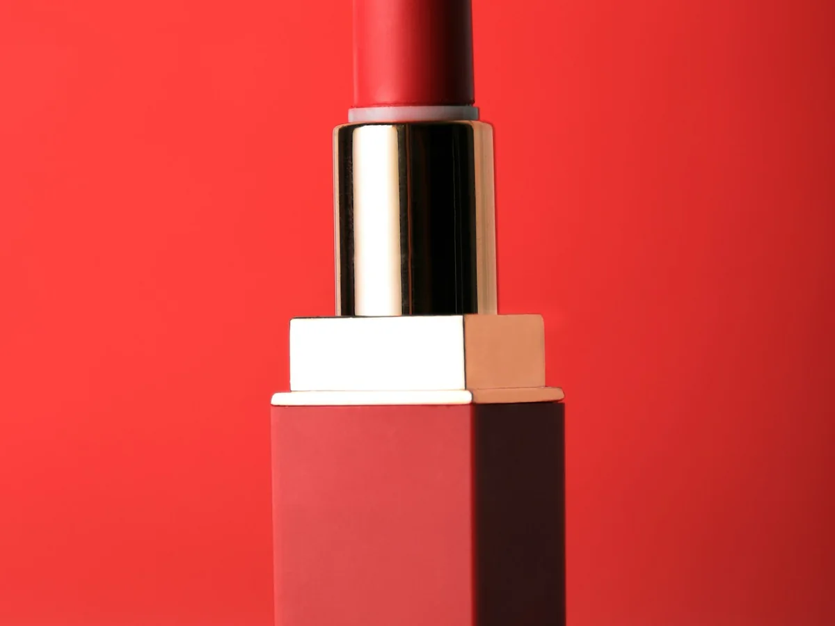 Representative cosmetics store photography for the fictional product Satin Colour Lipstick