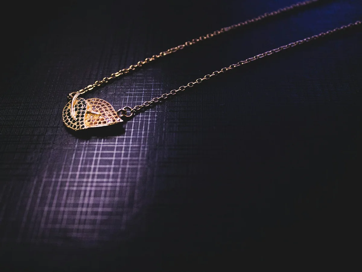 Representative diamond jewellery store photography for the fictional product Carat Pave Pendant