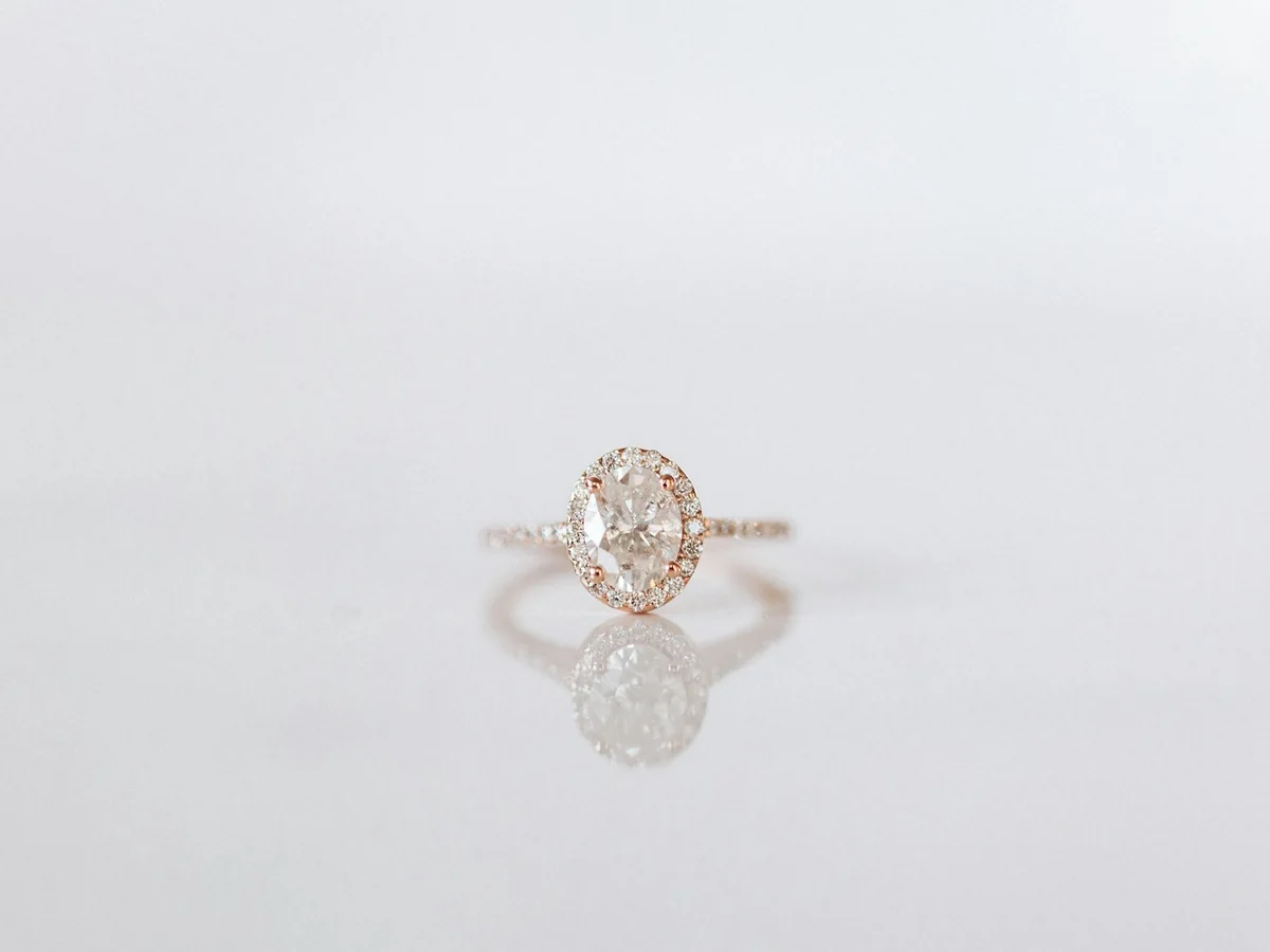 Representative diamond jewellery store photography for the fictional product Rose Gold Diamond Band