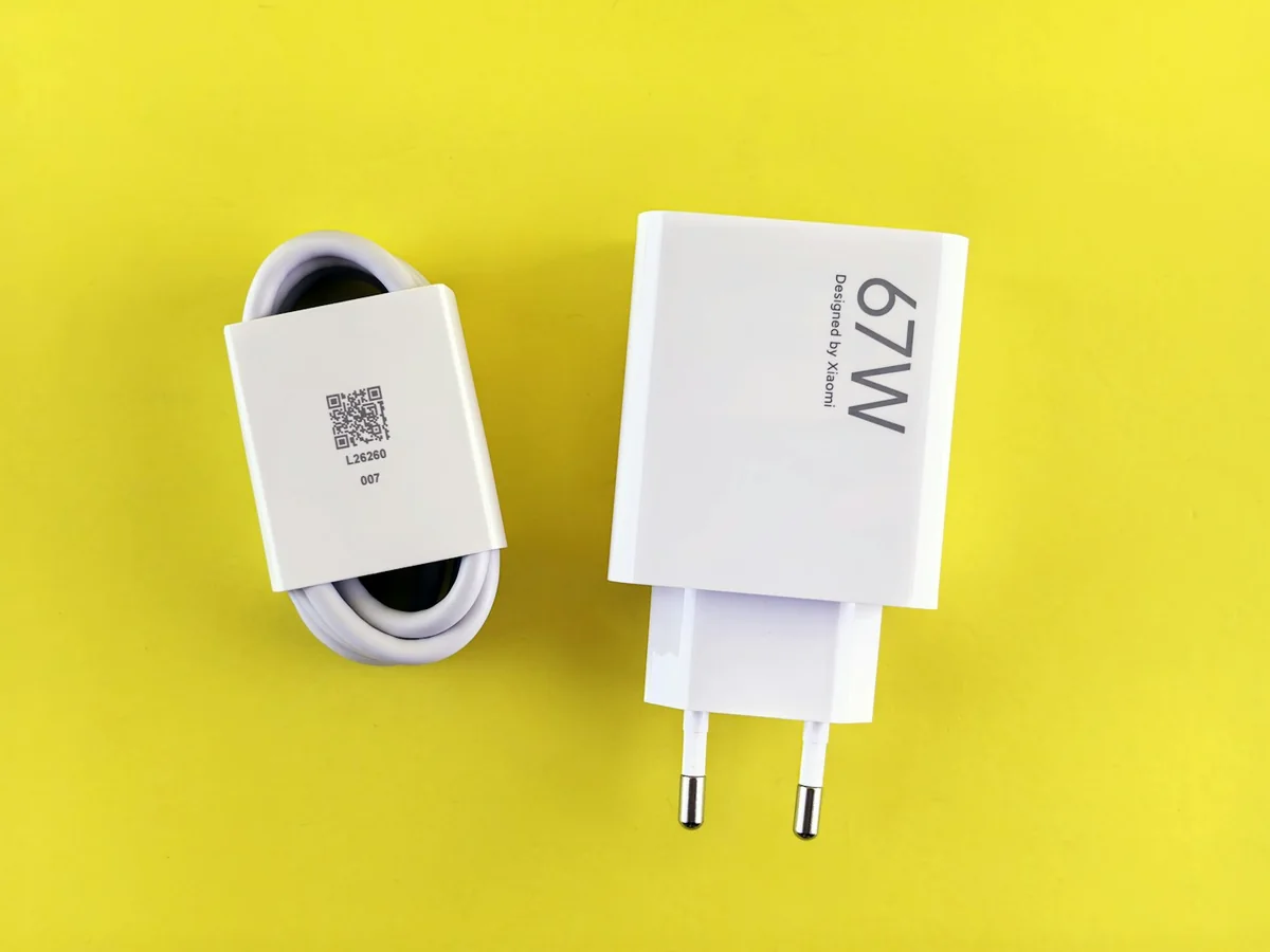 Representative electronics and mobile accessories photography for the fictional product 65W USB-C Charger