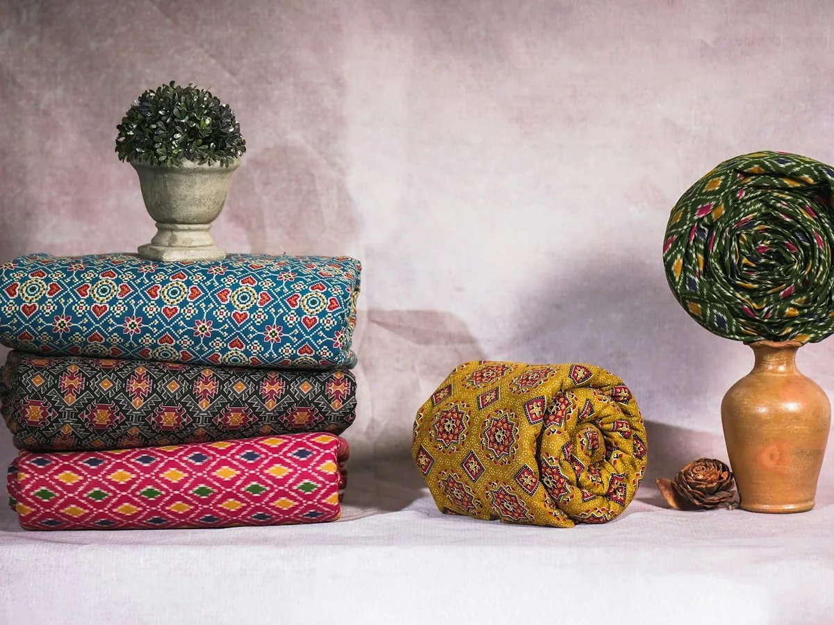 Representative fabric and textile store photography for the fictional product Indigo Block-print Cotton