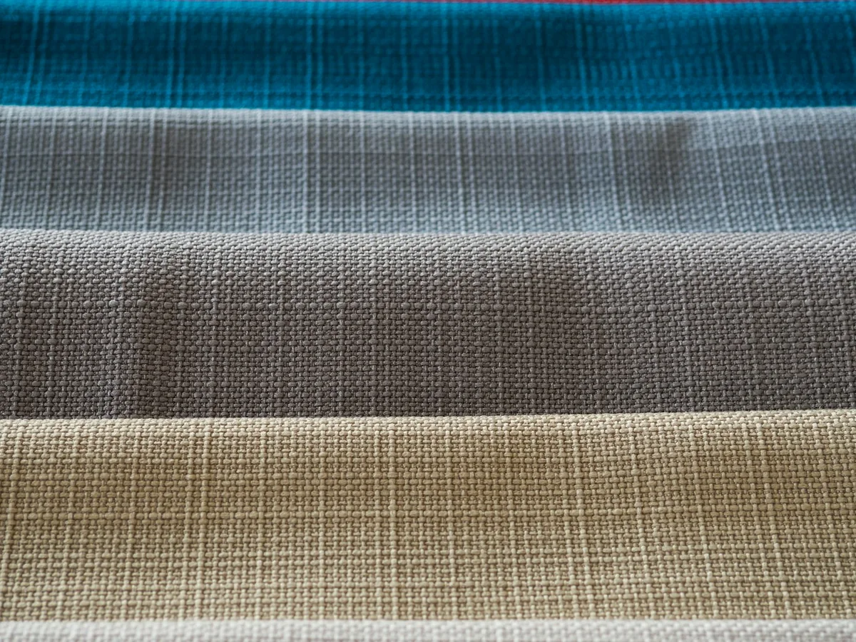 Representative fabric and textile store photography for the fictional product Handloom Linen Yardage