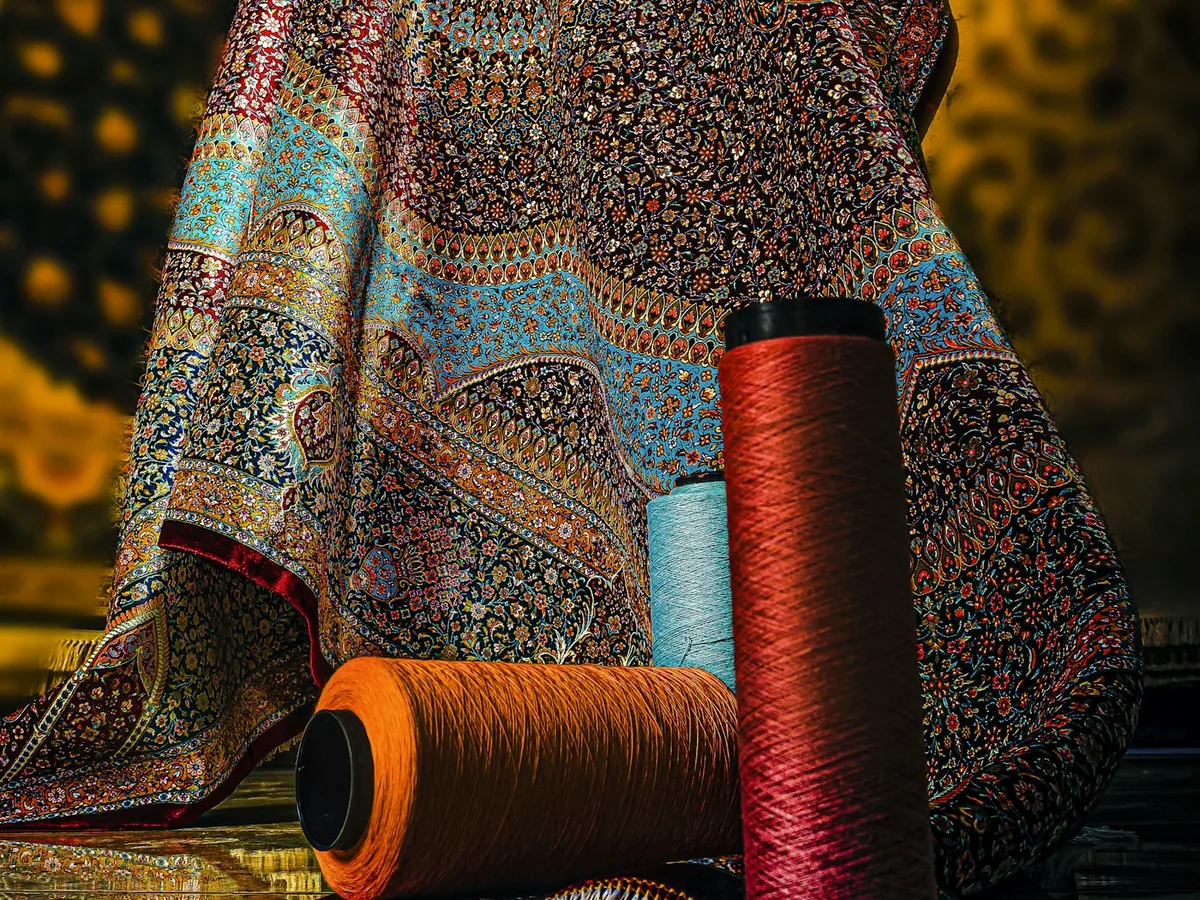 Representative fabric and textile store photography for the fictional product Embroidered Blouse Fabric