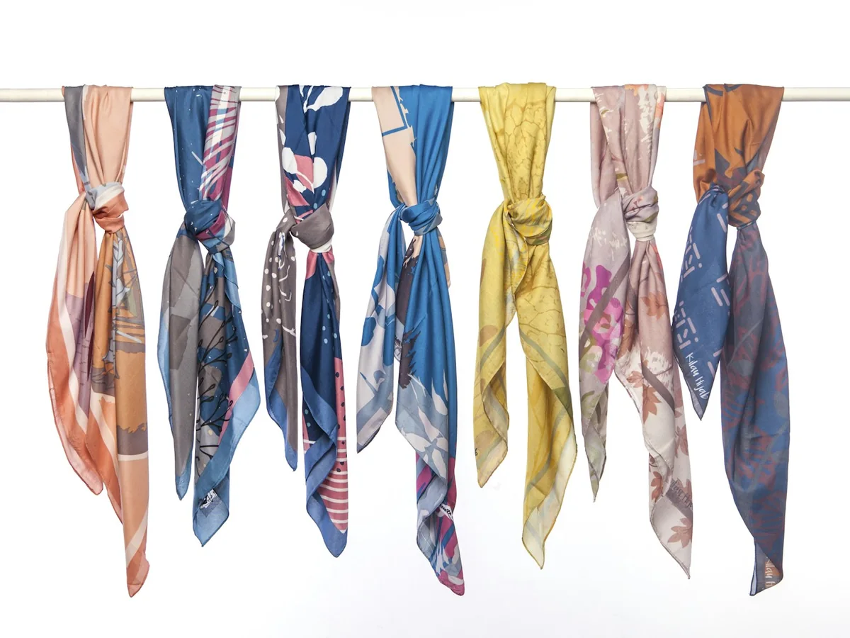 Representative fashion accessories photography for the fictional product Printed Silk Scarf