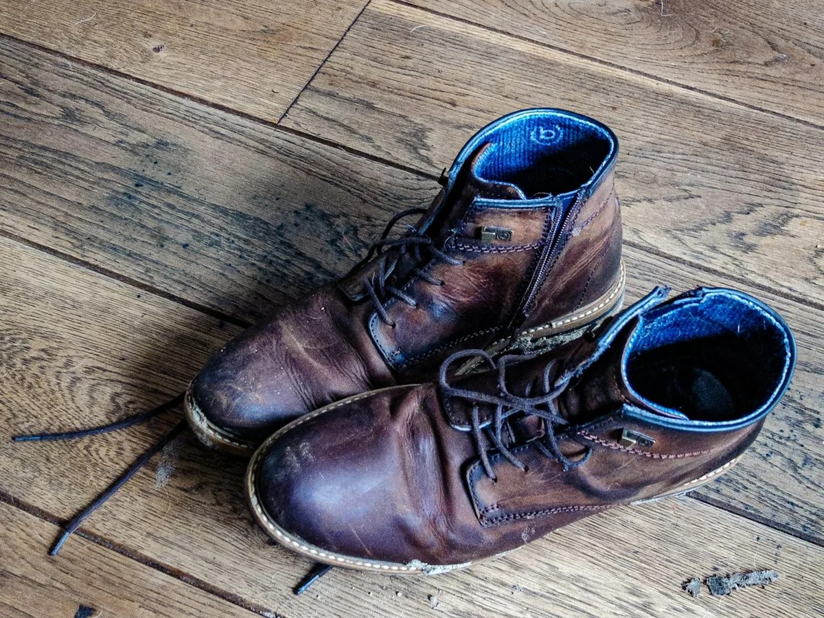 Representative footwear store photography for the fictional product Leather Work Derby