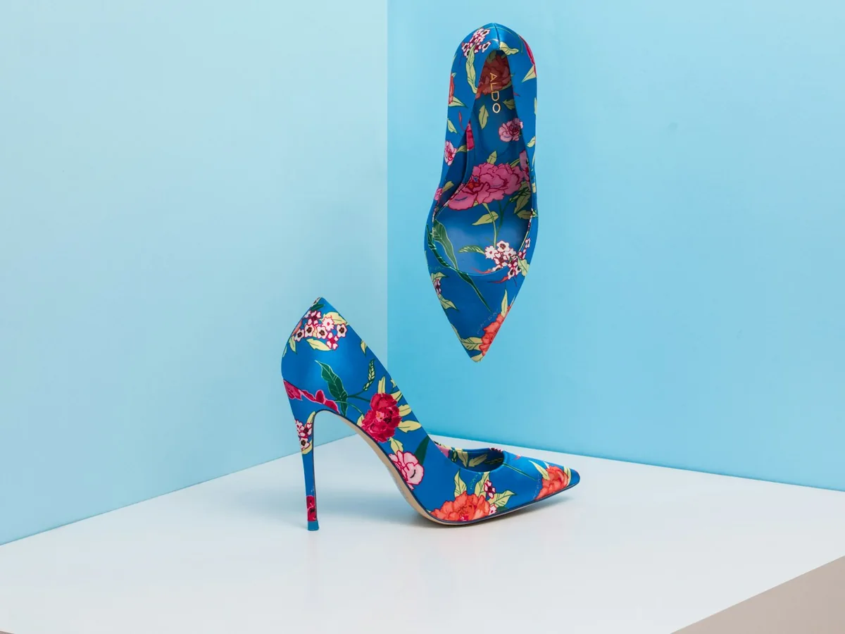 Representative footwear store photography for the fictional product Evening Block Heel