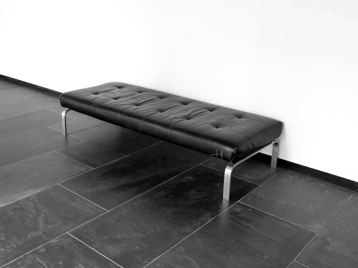 Representative furniture store photography for the fictional product Upholstered Bench