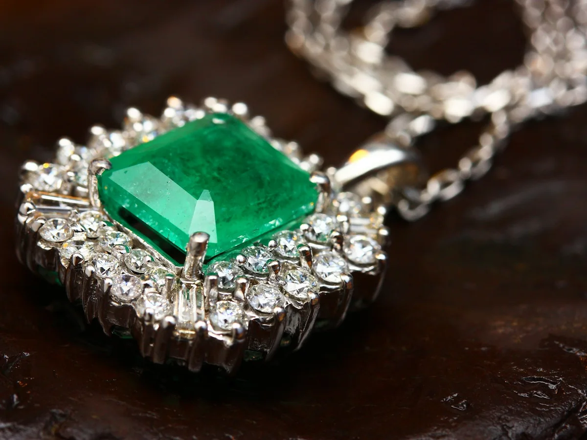 Representative gemstone jewellery photography for the fictional product Emerald Drop Pendant