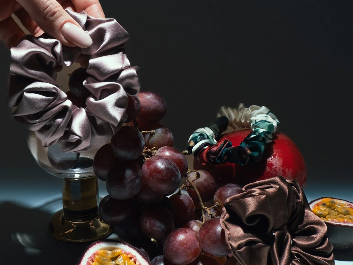 Representative hair accessories photography for the fictional product Silk Cloud Scrunchie