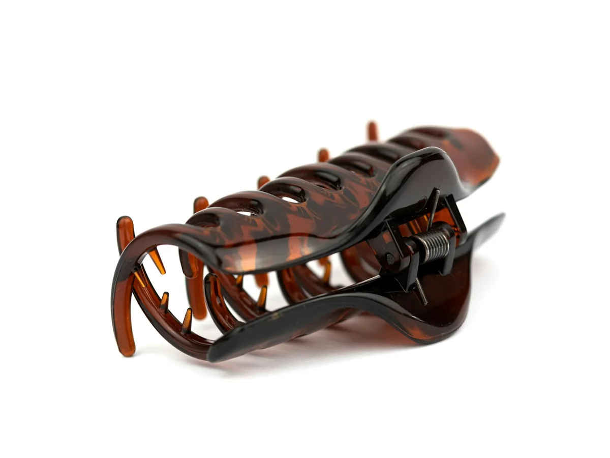 Representative hair accessories photography for the fictional product Everyday Claw Clip