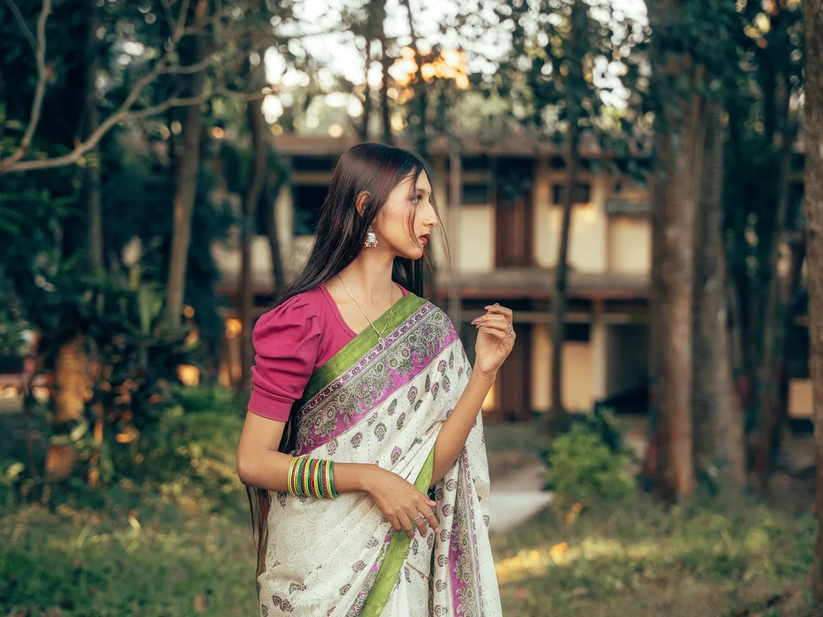 Representative handloom saree store photography for the fictional product Linen Temple Border Saree