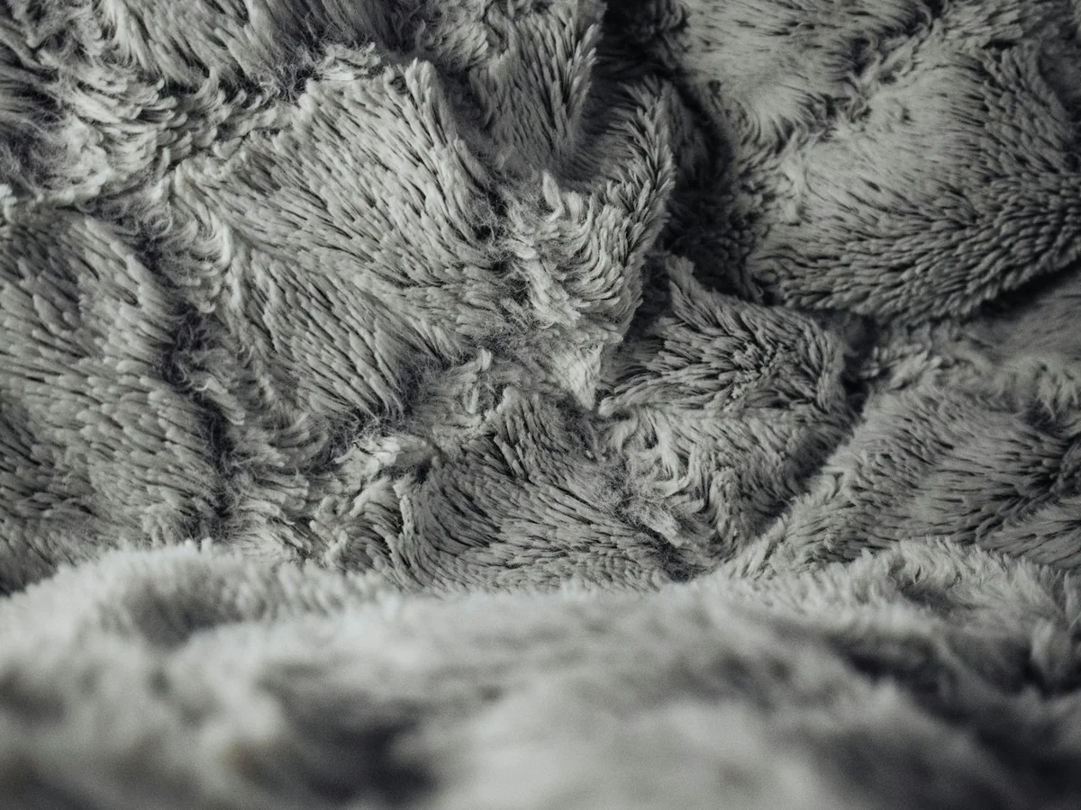 Representative home decor store photography for the fictional product Textured Throw Blanket