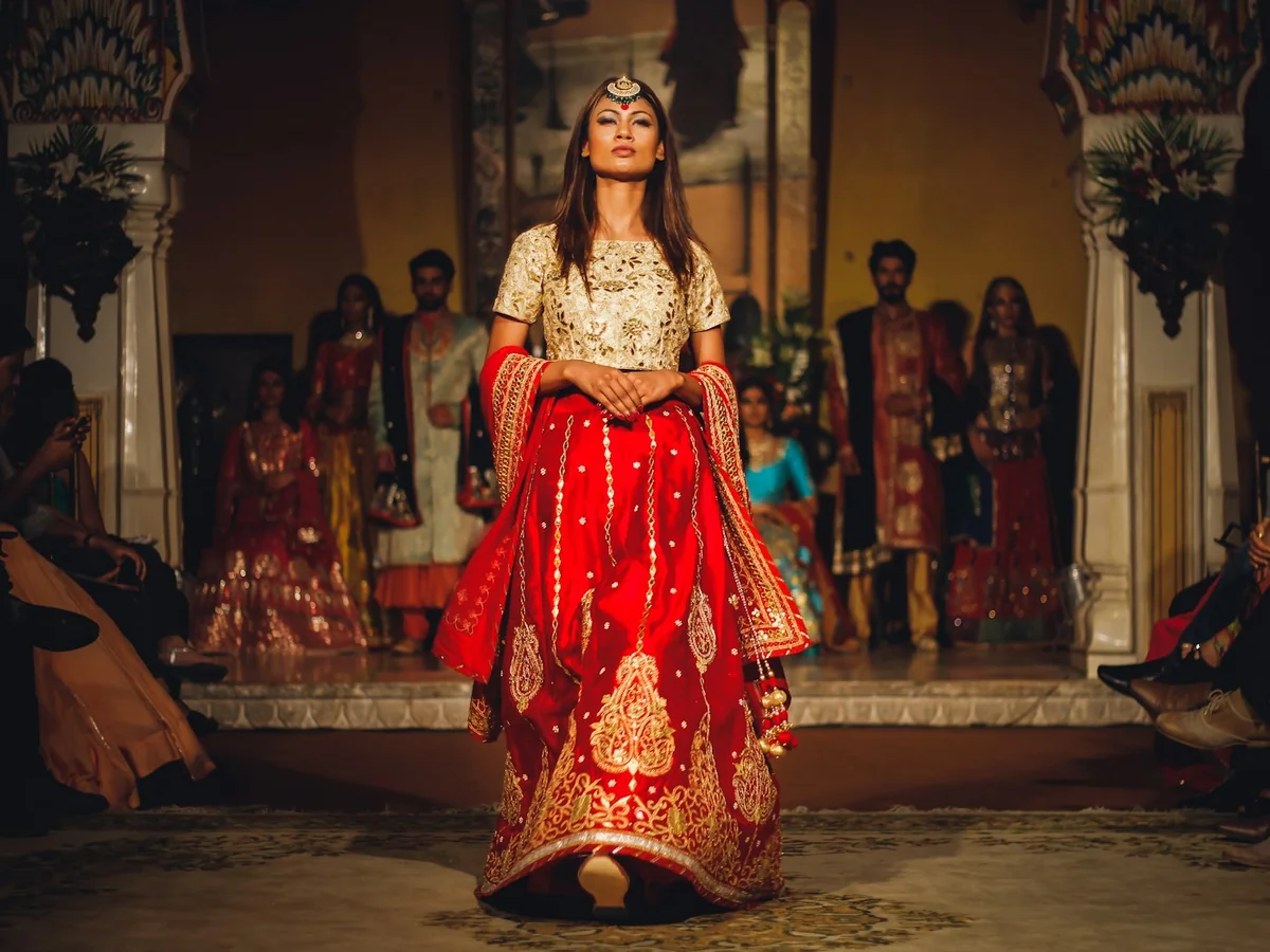 Representative lehenga and bridal wear photography for the fictional product Genda Mehendi Lehenga