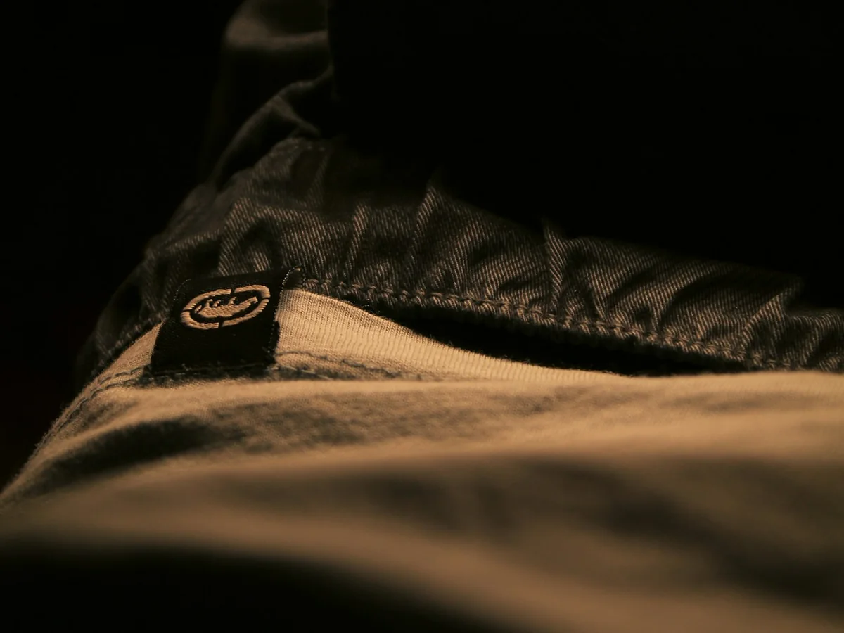 Representative men's clothing photography for the fictional product Field Regular Trousers