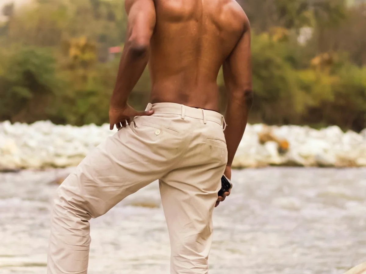Representative men's clothing photography for the fictional product Sunday Relaxed Chinos