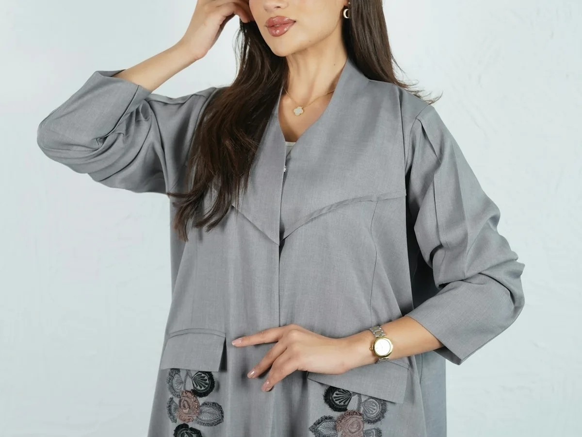 Representative modest fashion photography for the fictional product Linen Work Abaya