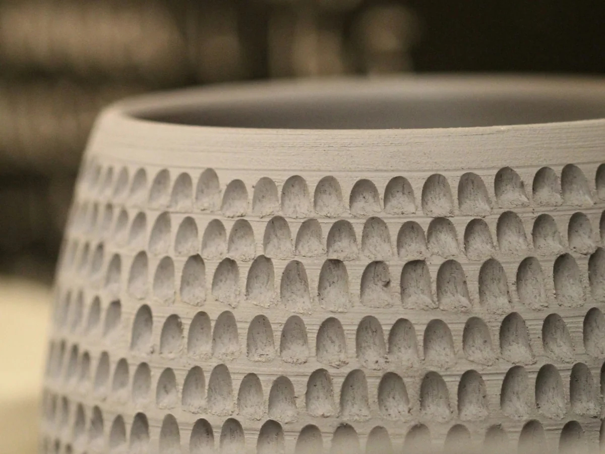 Representative multi-vendor marketplace photography for the fictional product Local Ceramic Planter