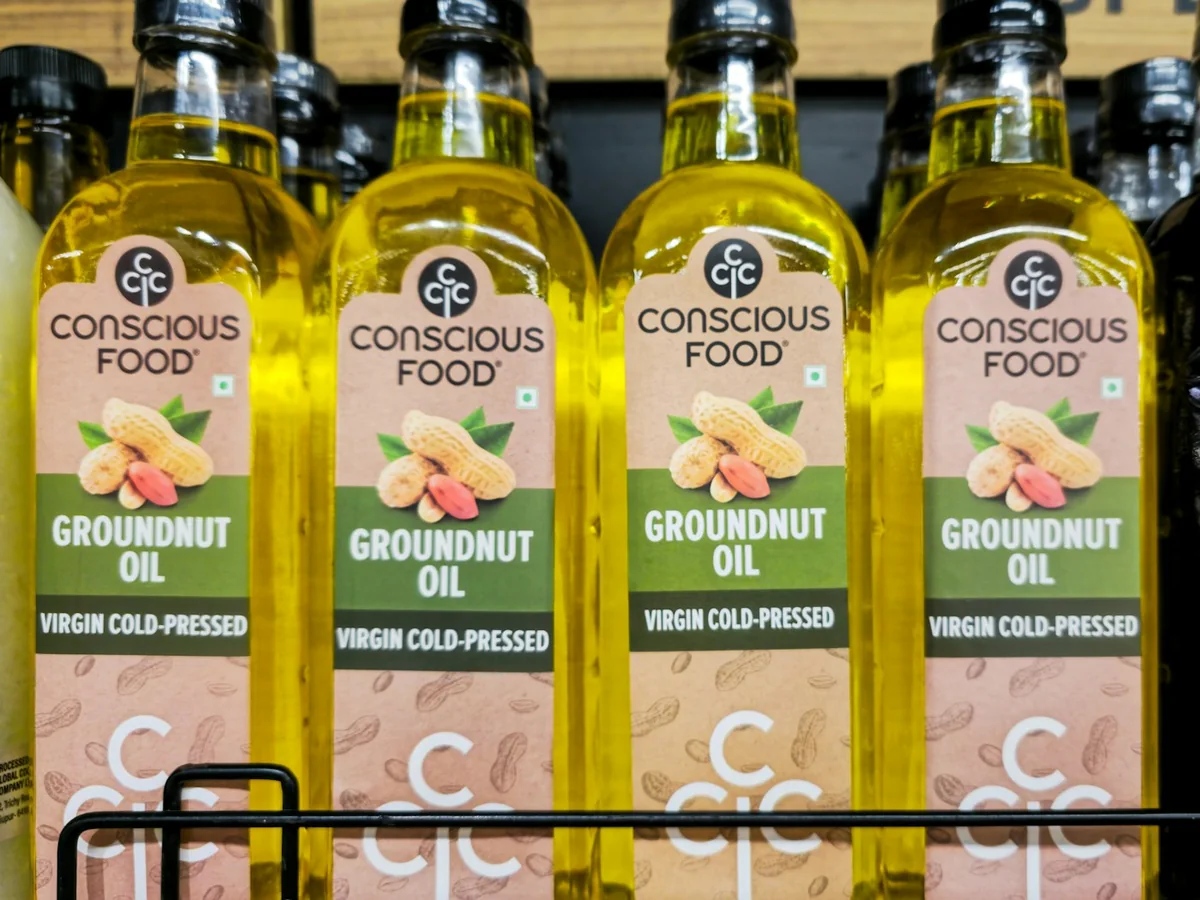 Representative organic grocery store photography for the fictional product Cold-pressed Groundnut Oil