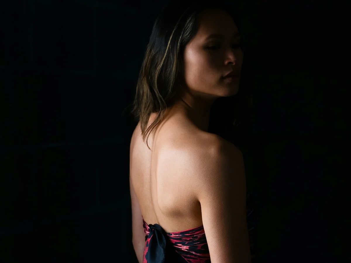 Representative plus-size fashion photography for the fictional product Everyday Wrap Top