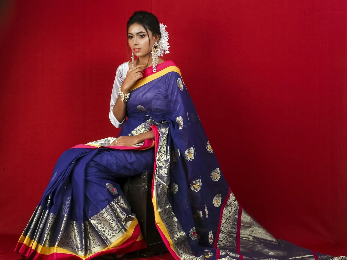 Representative saree shop photography for the fictional product Mogra Handloom Cotton Saree