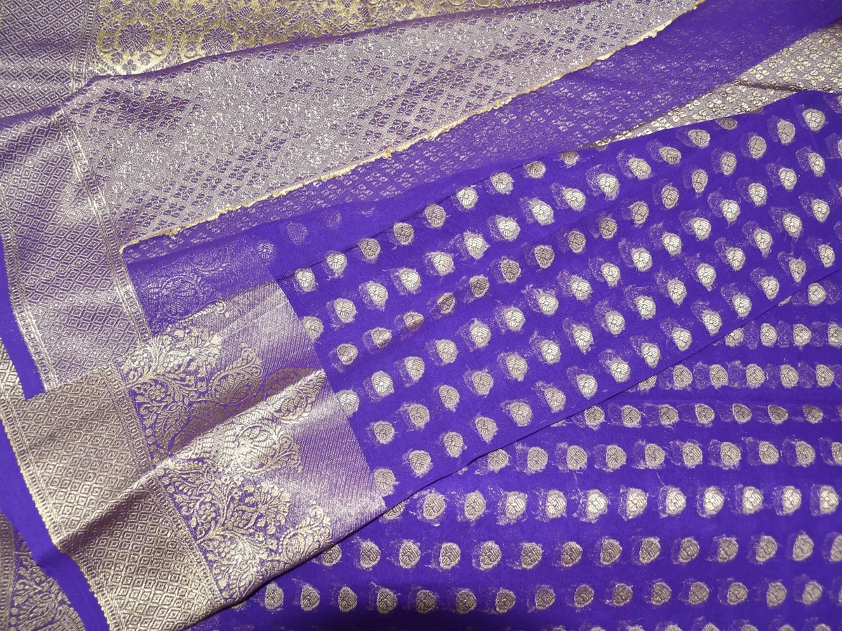 Representative saree shop photography for the fictional product Rasa Wedding Saree