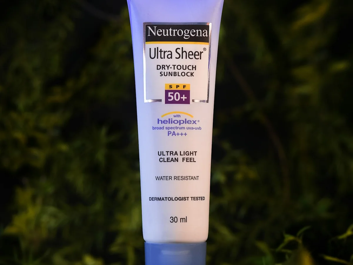 Representative skincare brand photography for the fictional product Daily Fluid Sunscreen