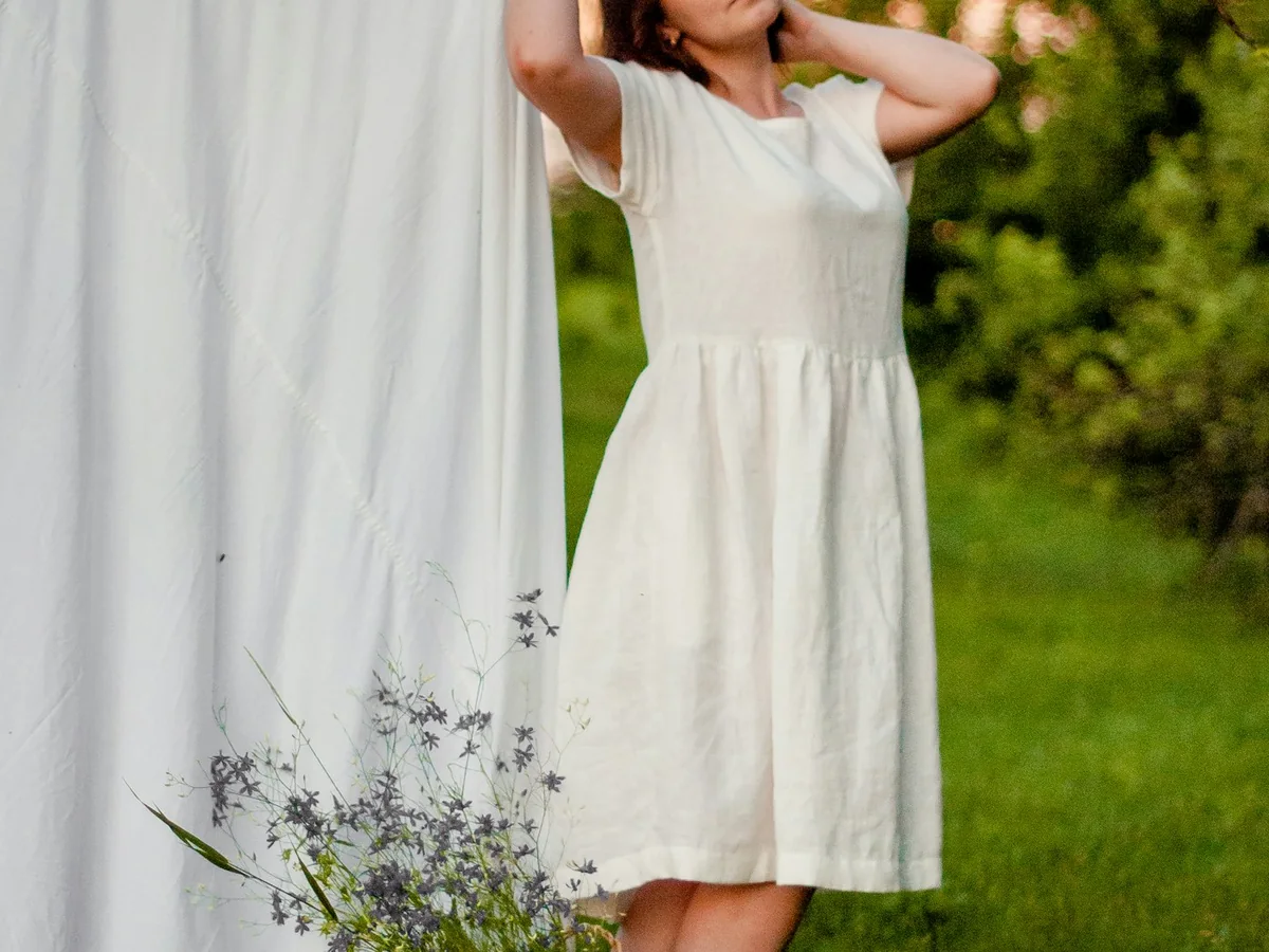 Representative sustainable fashion brand photography for the fictional product Earth Organic Cotton Dress