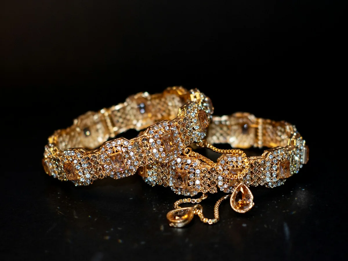 Representative temple jewellery photography for the fictional product Temple Bangle Pair