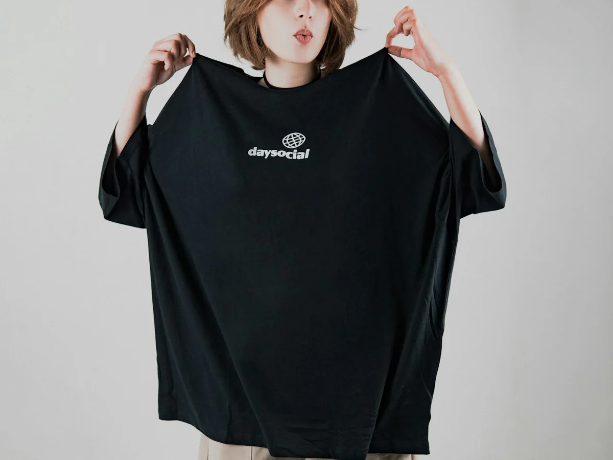 Representative t-shirt store photography for the fictional product Weekend Oversized Tee
