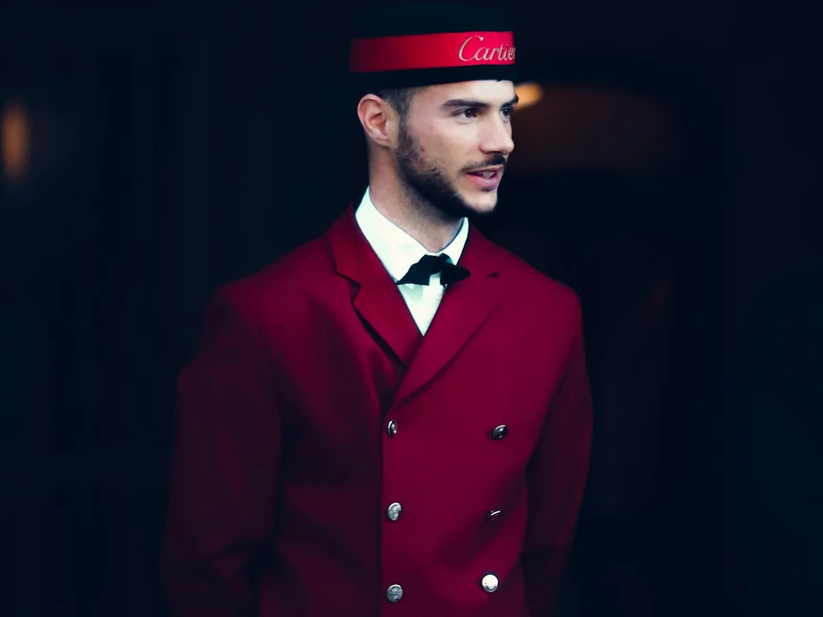 Representative school and corporate uniforms photography for the fictional product Hospitality Service Jacket