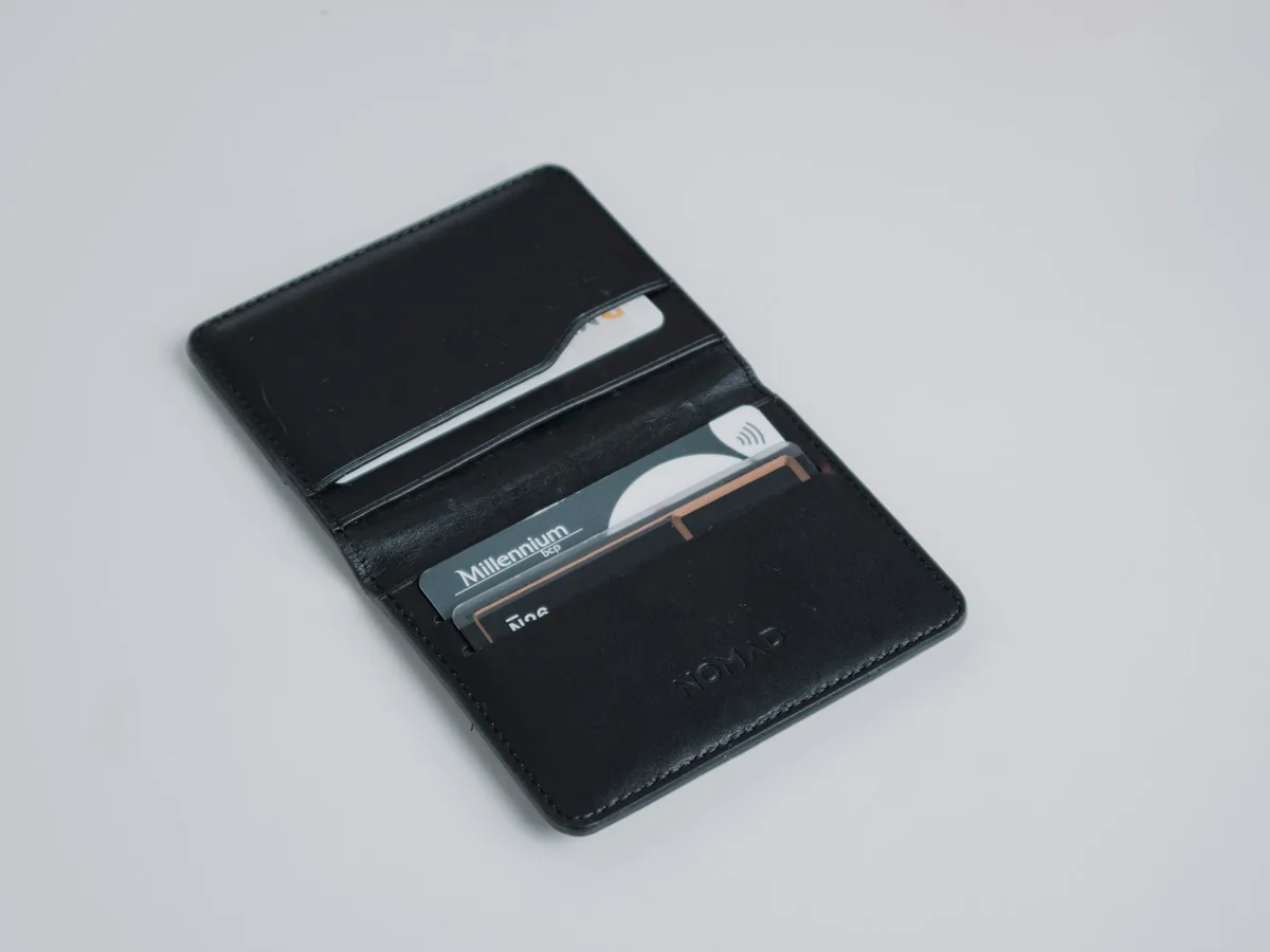Representative wallets and leather goods photography for the fictional product Slim Card Case