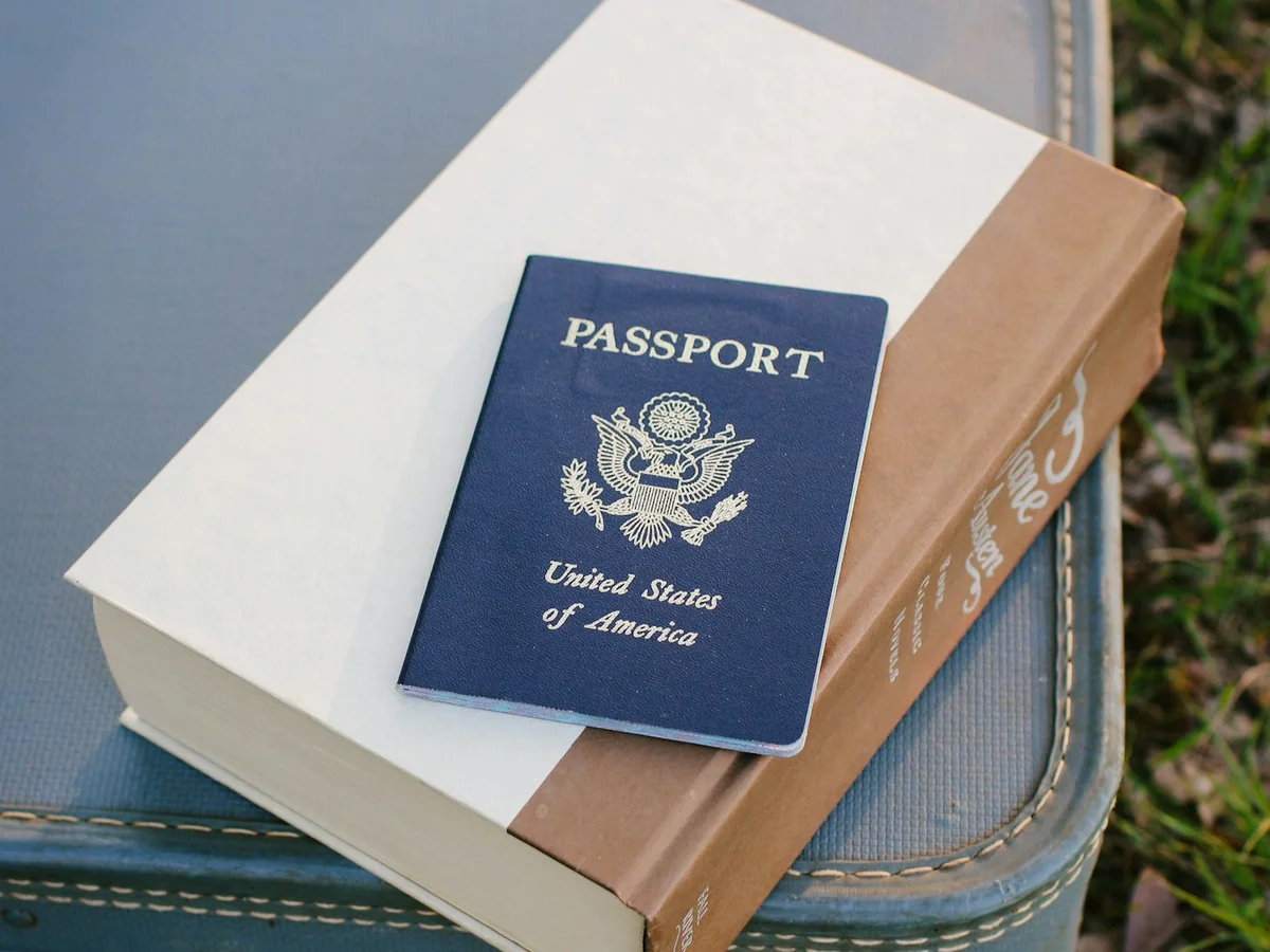 Representative wallets and leather goods photography for the fictional product Travel Passport Cover