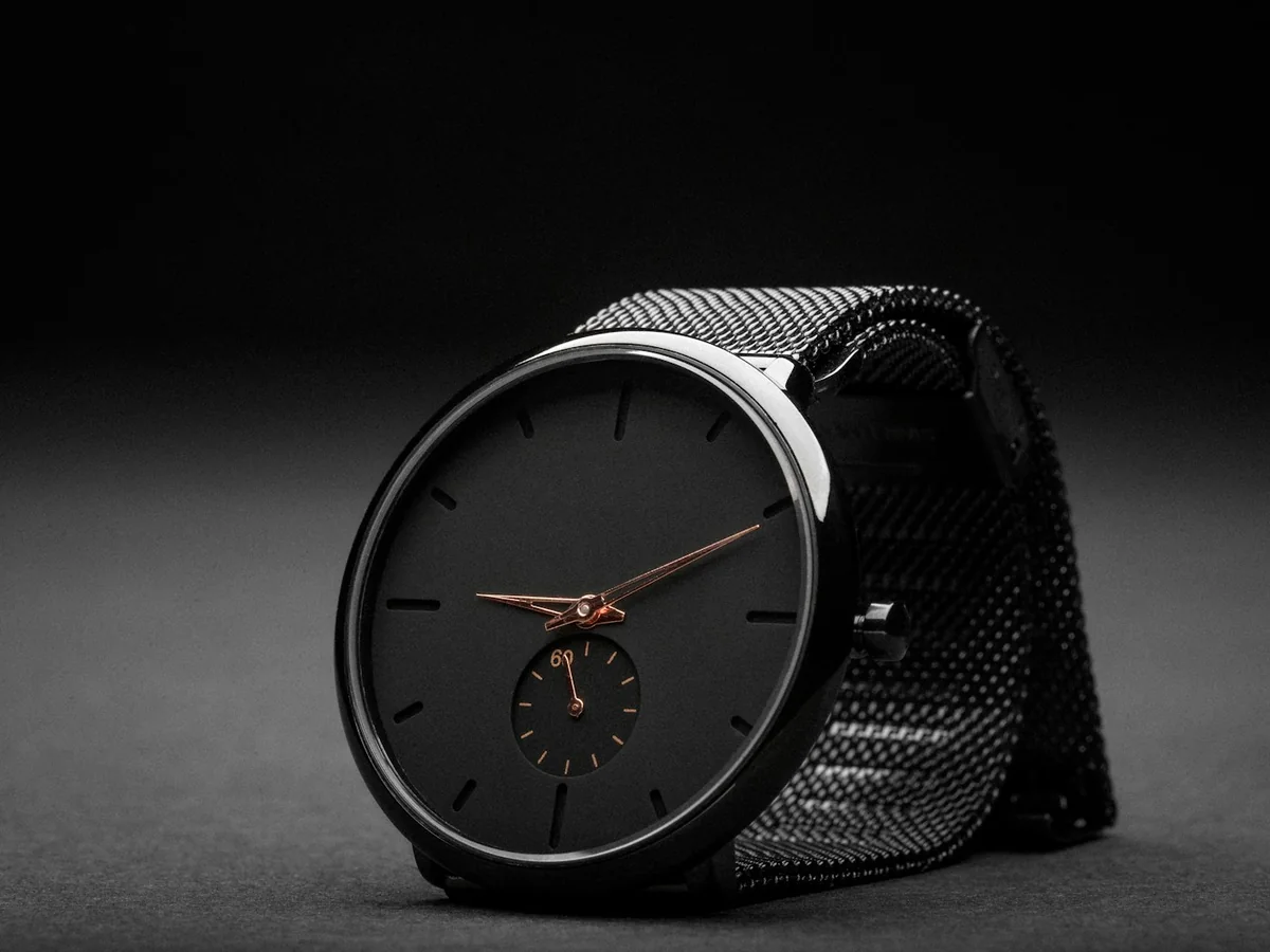 Representative watch store photography for the fictional product Minimal Mesh Watch