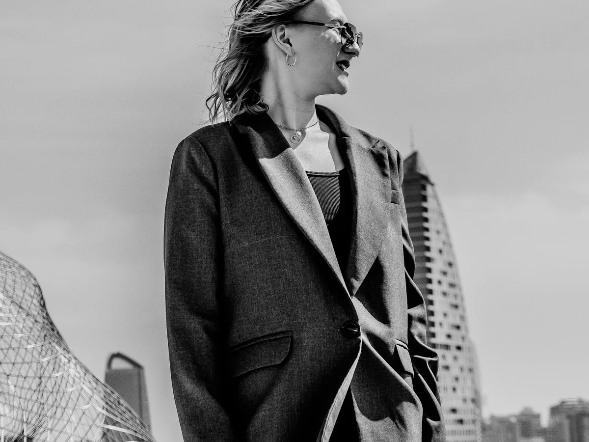 Representative women's western wear photography for the fictional product City Oversized Blazer